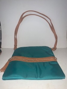 lot 104 image: SOFT TEAL & TAN SHOULDER  CROSSBODY HANDBAG  ANIMAL PRINT LINING  VERY NICE