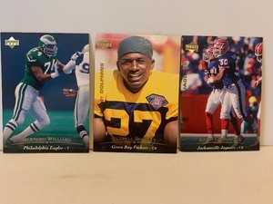 lot 140 image: UPPER DECK NFL FOOTBALL CARD LOT  BERNARD WILLIAMS, TERRELL BUCKLEY & KEITH GOGANIOUS  3 CARDS