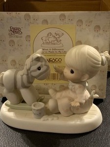 lot 257 image: 1995 PRECIOUS MOMENTS WHAT A DIFFERENCE YOUVE MADE IN MY LIFE FIGURINE  ENESCO #531138  ORIGINAL BOX & PAPERWORK