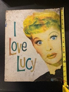 lot 261 image: I LOVE LUCY  LUCILLE BALL VINTAGE-STYLE METAL SIGN  APPROX. 12 x 16