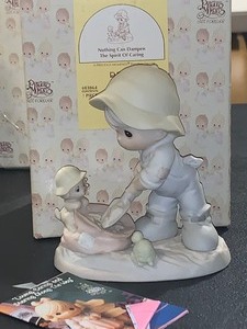 lot 296 image: PRECIOUS MOMENTS NOTHING CAN DAMPEN THE SPIRIT OF CARING FIGURINE  ENESCO #603864  ORIGINAL BOX & PAPERWORK