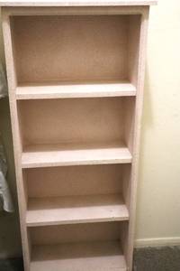 lot 63 image: Solid Wood Tiered Shelf - has been painted sand textured pink. - 20W x 8.5D x 47T (MBR)