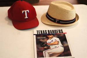 lot 70 image: Two Texas Rangers Hats and Magazine. (LR)