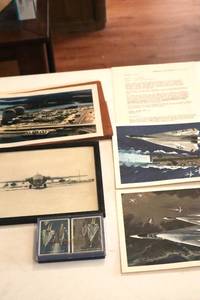 lot 71 image: 1960s General Dynamics collectible items, aircraft prints, playing cards . (LR)
