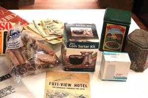 lot 73 image: Coin Starter Kit, envelopes, coin rolls, stencils, green stamps and magnifying plate. (LR)