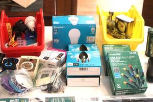 lot 74 image: Misc Items - door sweeps - new, remotes, light bulbs, timers and other items. (LR)