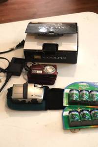 lot 75 image: Nikon Coolpix Camera, Minolta Camera plus film. (LR)