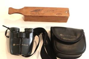 lot 76 image: Bill Harper Duck Call and Leupold Binoculors. (LR)
