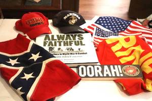 lot 87 image: Marine Hats, Book and Flags . (LR)