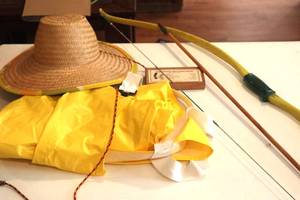 lot 89 image: Weather Bone, Waders, Cross Bow and Hat. (LR)