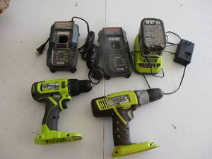 lot 164 image: Cordless Drill with Battery Packs - powers on working. (GAR)