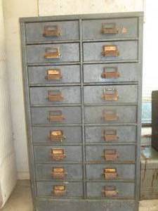 lot 201 image: Metal Cabinet - includes items - 36T x 21W x 12D - very heavy (GAR)