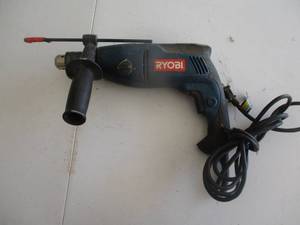 lot 210 image: Ryobi Hammer Drill - Powers on (GAR)