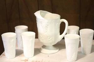 lot 120 image: Indiana Milk Glass Harvest Grape Pitcher and Glasses. (LR)