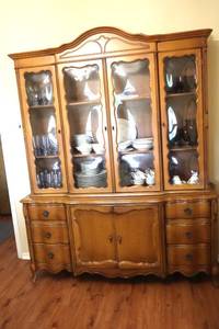 Vintage Maple Hutch - two piece, glass front. Very nice condition and clean, Items no included in cabinet. 62W x 16D x 75T. (DR)