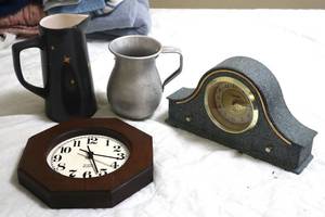 lot 326 image: Two clocks and Two Pitchers - (up)