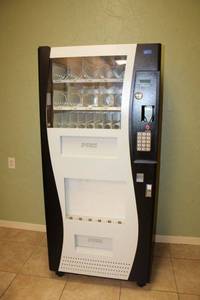 lot 1 image: Commercial Vending machine with keys (need coin part)  Model GO-380