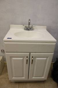 lot 19 image: Bathroom vanity cabinet with Sink