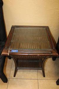 lot 27 image: Dark brown bamboo and rattan side table