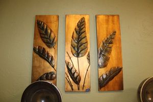 lot 30 image: Three part metal wall art panels