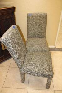 lot 48 image: Two Leopard print upholstered high back dining chairs