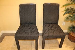 lot 71 image: Two high back black upholstered dining chairs