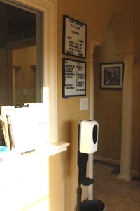 lot 74 image: Sanitizer stand, letter boards, and wall art print