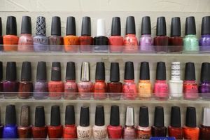 lot 87 image: Nail polish - 3 rows on shelf
