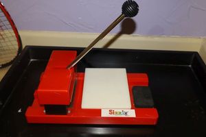 lot 101 image: Sizzix Die-Cutter - red die cutter machine