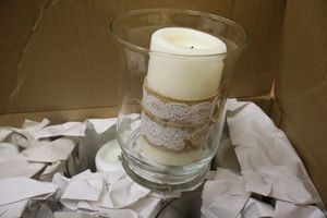 lot 46 image: Decorative pillar candles with glass holders - 9 total