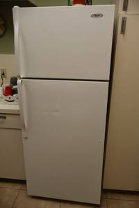 lot 63 image: Whirlpool refrigerator freezer model W8TXNGFWQ01