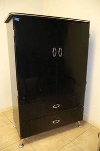 lot 139 image: Black storage or entertainment cabinet - 40W x 61H x 21D