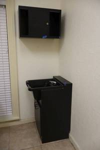 lot 147 image: Salon shampoo bowl and towel cabinet