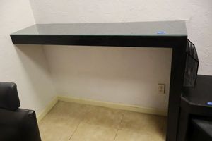 lot 188 image: L-shape shelf with glass top (bring tools to remove)