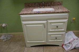 lot 191 image: White sink cabinet with stone top