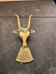lot 182 image: Brass longhorn boot jack