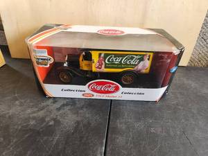 lot 92 image: Coca-Cola collection Matchbox collectible 1925 Ford Model TT
