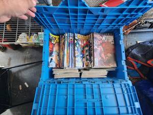 lot 64 image: Bin with a selection of comics