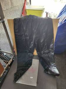 lot 167 image: Pair of Dior Luxe black faux leather pants