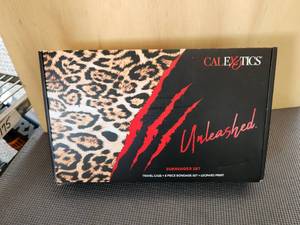 lot 88 image: Calexotics Unleashed surrender set with travel case