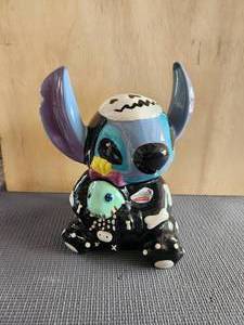 lot 25 image: Disney Snitch skeleton costume cookie jar
