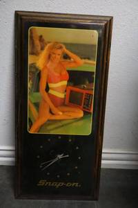 Snap On wall clock with photo of model on car