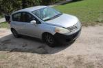 2009 Nissan versa 4-door runs and drives the check engine light is on has newer tires on the front has new catalytic converter new muffler and new code saying it needs a O2 sensor
