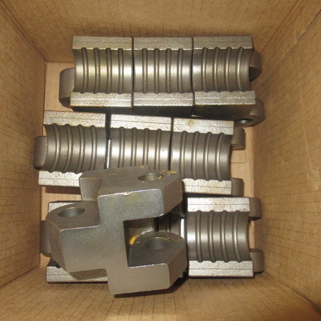 lot 124 image: Coiled Tubing Injector Gripper Block Parts