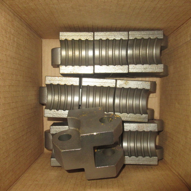 lot 128 image: Coiled Tubing Injector Gripper Block Parts