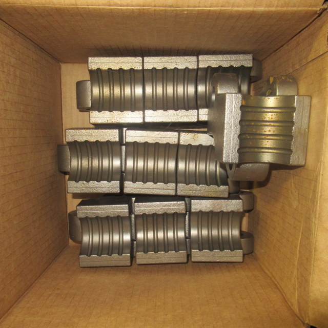 lot 134 image: Coiled Tubing Injector Gripper Block Parts
