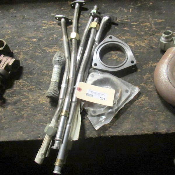 lot 521 image: Diesel Motor Heat Exchange Flex Tubes And Exhaust Flanges
