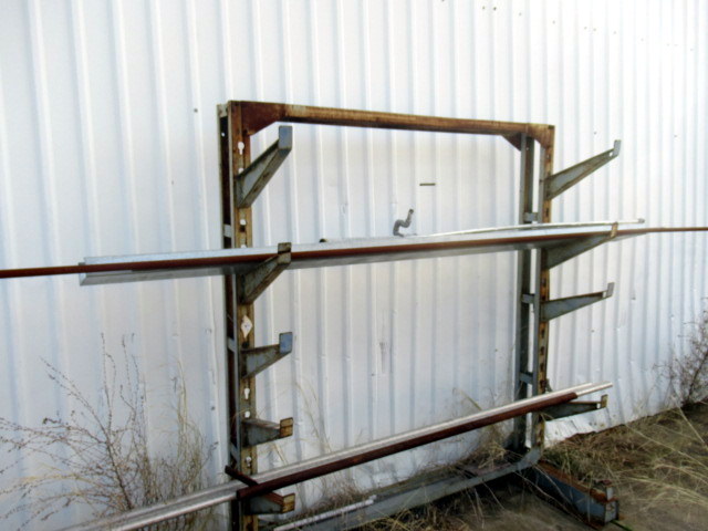 lot 1116 image: 2 Steel Pipes With Rack