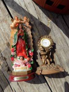 lot 98 image: Virgen de Guadalupe  and a cherub clock