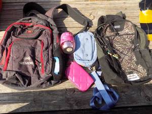 lot 105 image: Back packs and bags